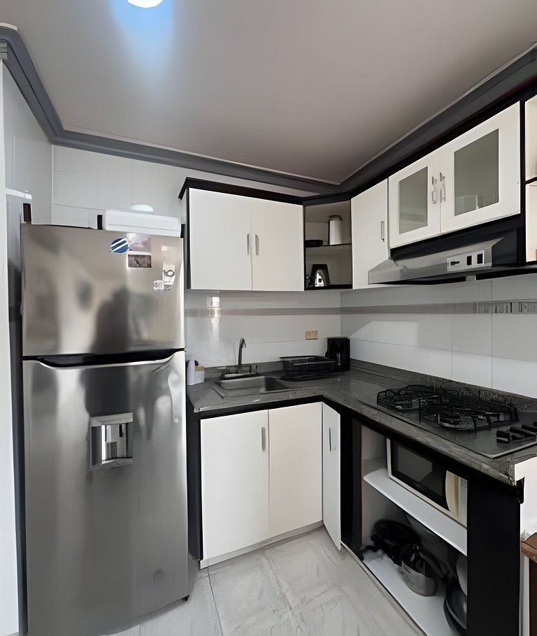 Apartamento con piscina y cancha de tenis